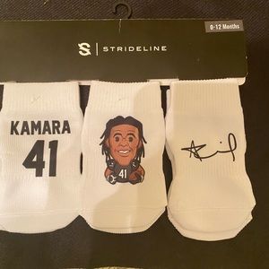 Are you a NO Saints Fan!!! You will love these Alvin Kamara white baby socks.